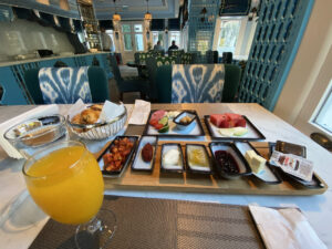 Traditional turkish breakfast spread with meat, cheese, bread and pastries