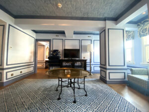 Living room suite at Hagia Sofia Mansions Istanbul, with paneled walls and herringbone floors