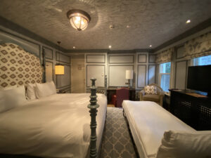 Istanbul hotel room with plush bedding and blue carpet