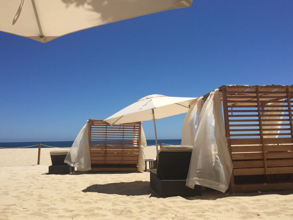 Two cabanas on a beach in Los Cabos